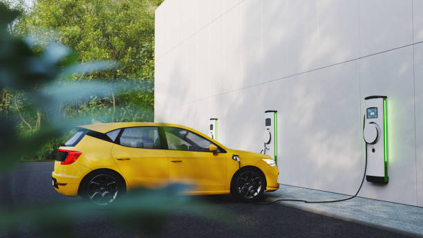 Yellow sports car charging at electric charging port